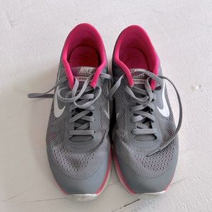 Gray and pink Nikes